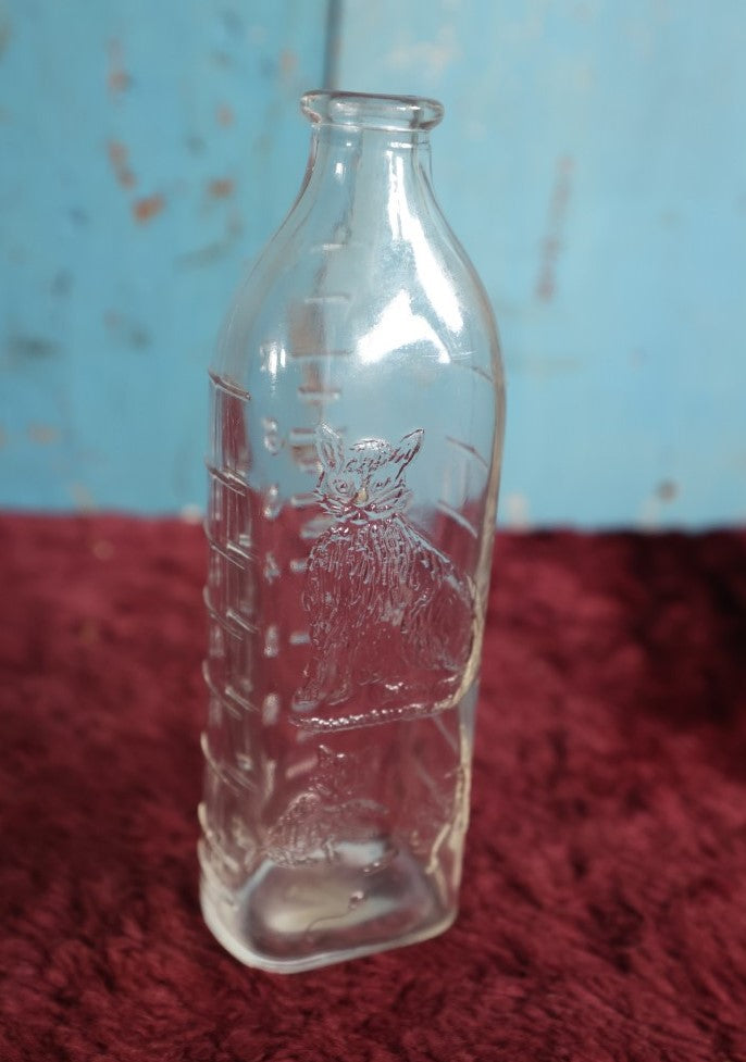 Lot 133 - Antique 8 Ounce Clear Glass Baby Bottle With Embossed Cat And Kittens