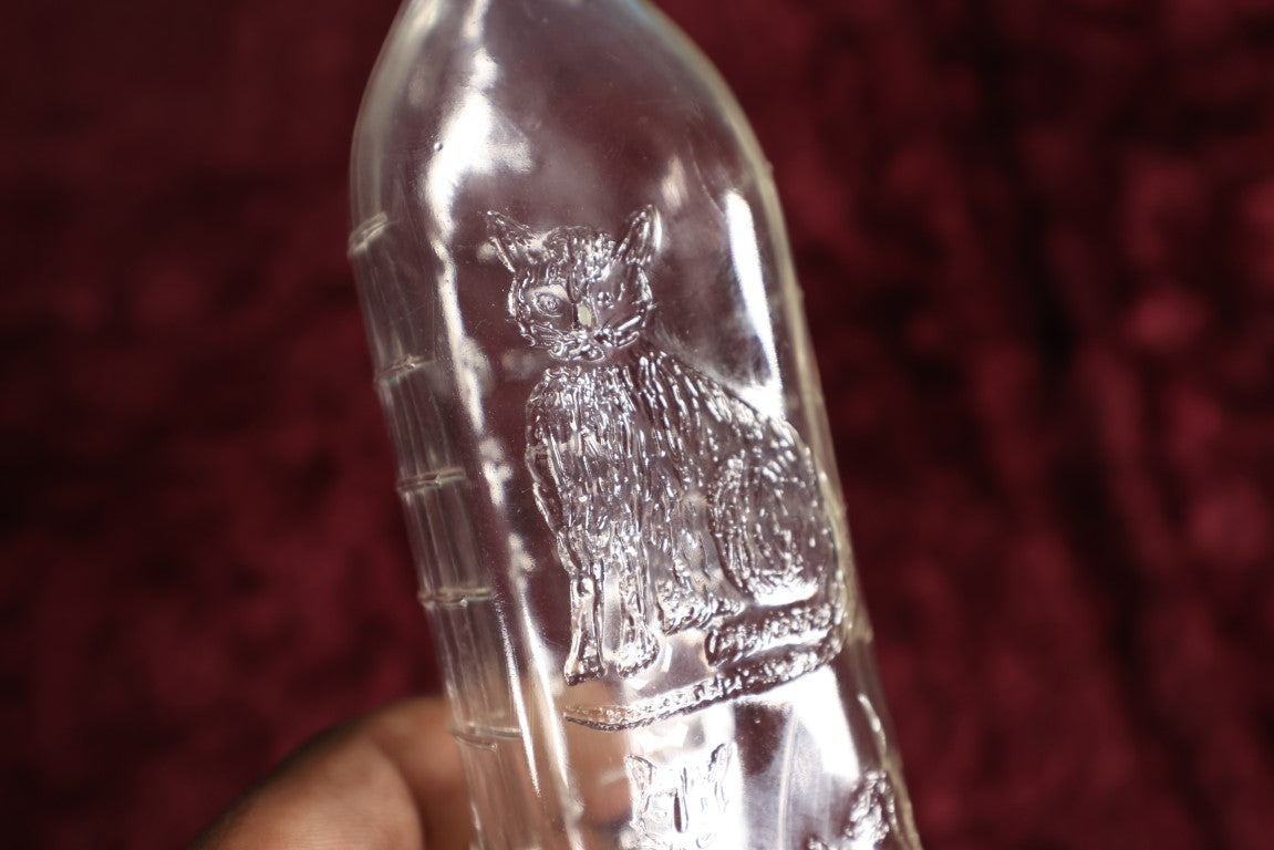 Lot 133 - Antique 8 Ounce Clear Glass Baby Bottle With Embossed Cat And Kittens