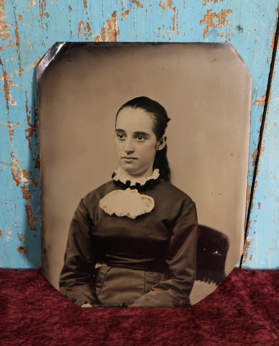 Lot 068 - Incredibly Clear, Fine Condition Full Plate Tintype Of Pretty Young Woman, White Ruffle On Shirt, Hair Pulled Back