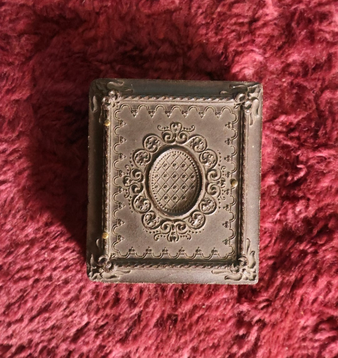 Lot 070 - Antique Double 1/9th Plate Ambrotype Photos In Thermoplastic Case; One Ruby Ambroype Of Young Man With Unusual Posture, Traditional Ambrotype Of Young Girl, Note Different Mats