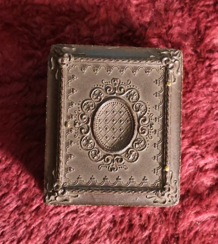 Lot 070 - Antique Double 1/9th Plate Ambrotype Photos In Thermoplastic Case; One Ruby Ambroype Of Young Man With Unusual Posture, Traditional Ambrotype Of Young Girl, Note Different Mats