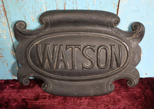 Lot 071 - Antique Carved Wood Black Painted Family Name Plaque, "Watson," Originally Mounted Flat To Something, About 16" x 11"