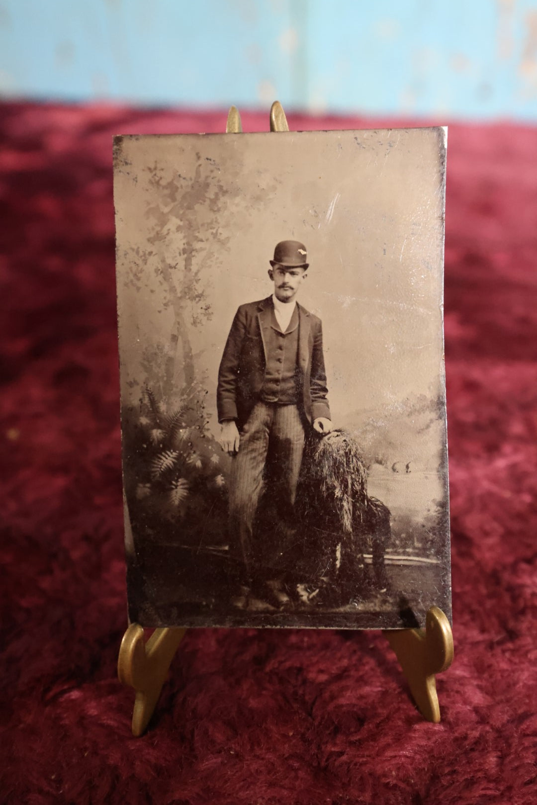 Lot 103 - Tintype - Young Man In Bowler Hat, Suit, Leaning On Chair, Trees Backdrop