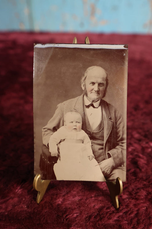 Lot 104 - Tintype - Old Balding Man, Grandfather, Holding Unhappy Looking Baby