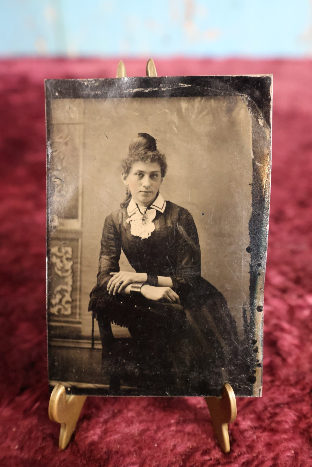 Lot 109 - Tintype - Pretty Young Woman With Up-Do, Leaning On Arms On Chair Arm, Wearing Bracelets, Cuffs