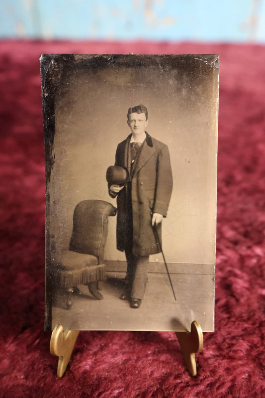 Lot 112 - Tintype - Young Man Holding Bowler Cap, Long Coat, Holding Swagger Stick Cane