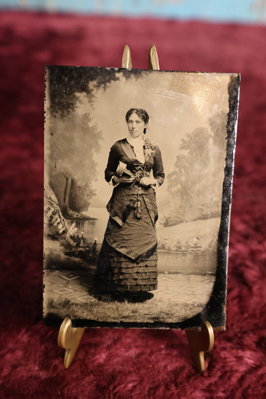 Lot 114 - Tintype - Young Woman In Dress Holding Stereo Viewer