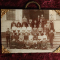 Lot 131 - Antique Photo Behind Glass With Brass Corners, School Group Photo, Note Boy In Window, With Hanger On Back