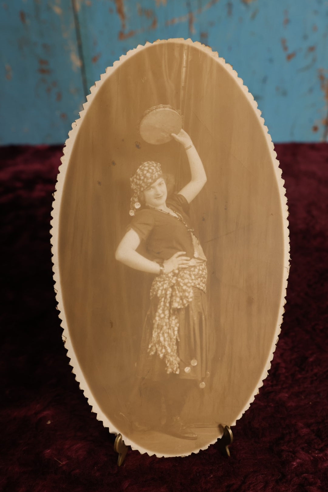 Lot 135 - Small Boarded Photo - Oval, Spikey Cut Edge Of Gypsy Dressed Woman With Tambourine