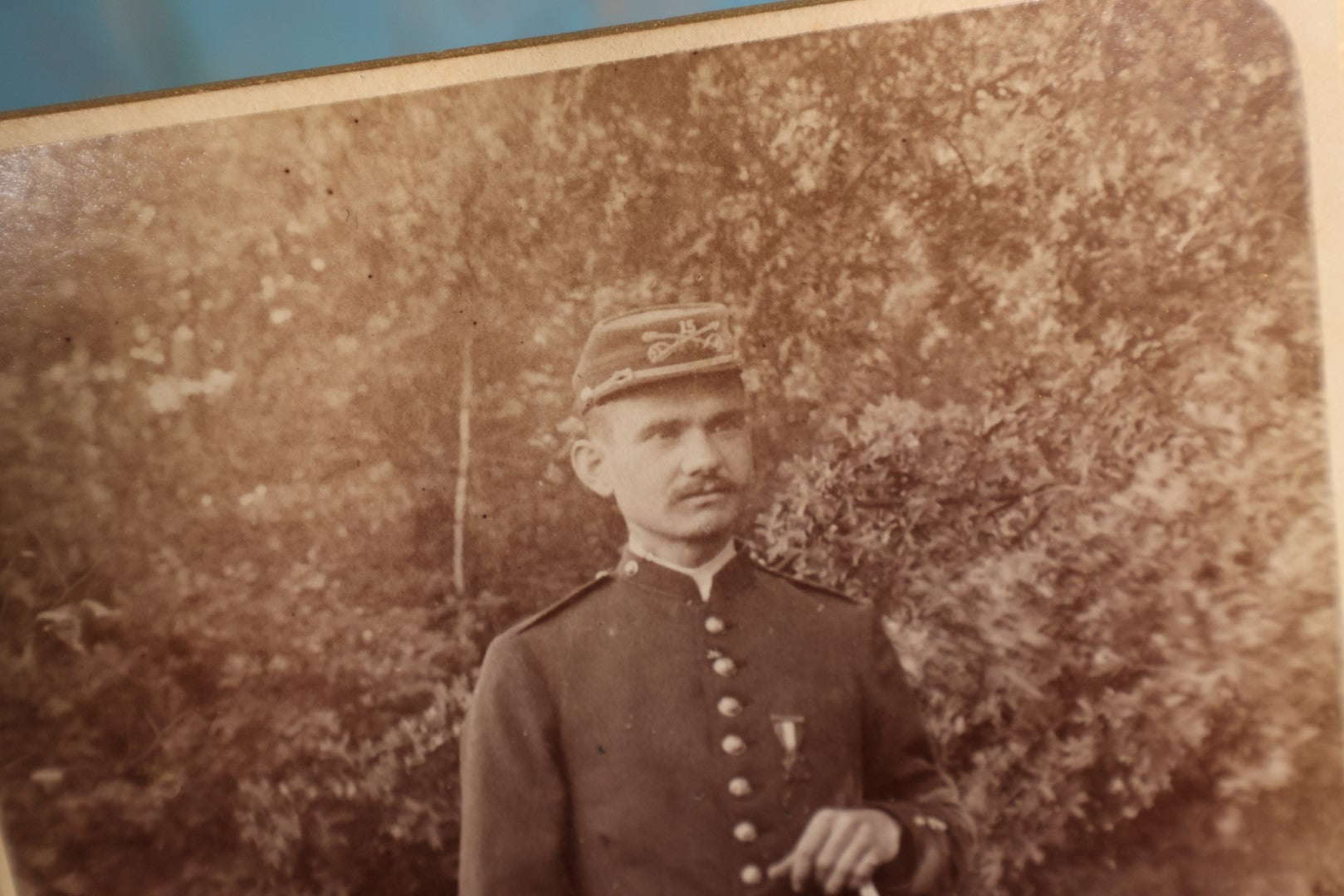 Lot 147 - Cabinet Card - Solder Standing With Hand Resting On Sword Hilt, Cap, Stripe Down Pants, Outdoor Photo, Wearing Medal