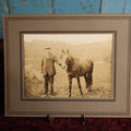 Lot 154 - Boarded Photo - Young Man In Scally Cap Holding Small Horse, Outdoor Photo