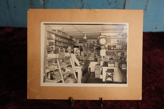 Lot 156 - Boarded Photo - Old Man Behind Counter Of General Store, Many Products And Advertisments, Old Gold Tobacco Sign