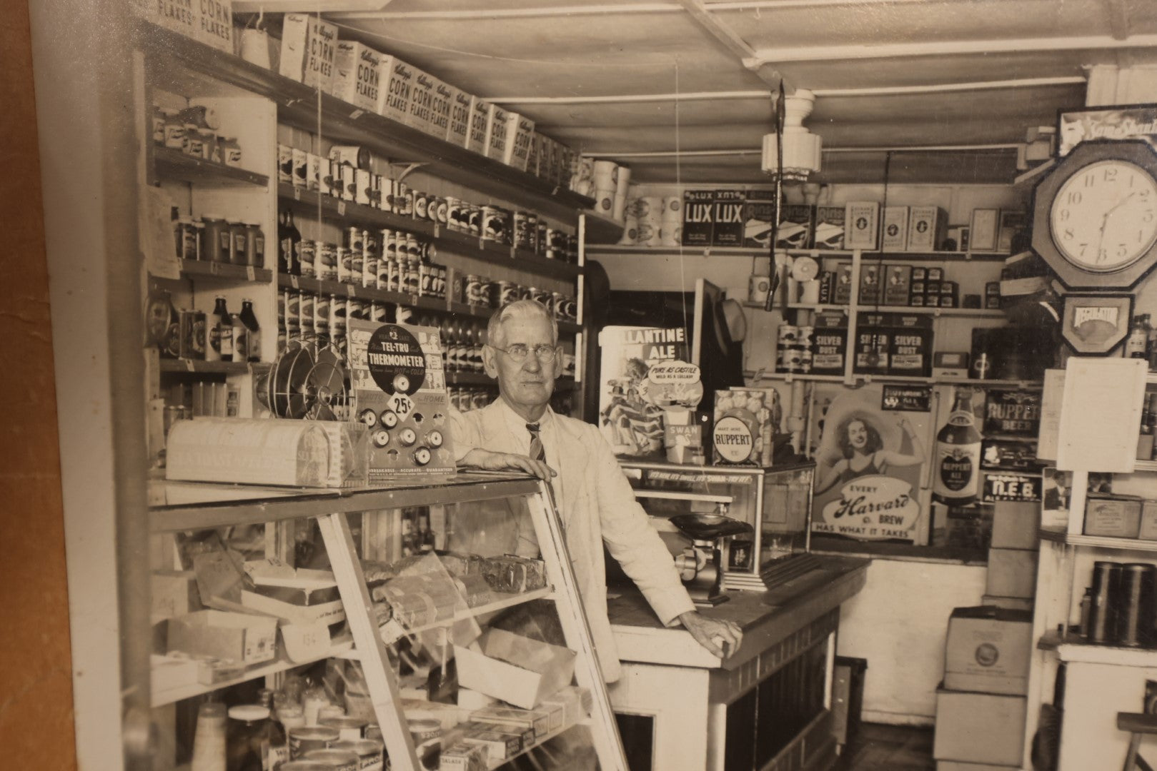 Lot 156 - Boarded Photo - Old Man Behind Counter Of General Store, Many Products And Advertisments, Old Gold Tobacco Sign