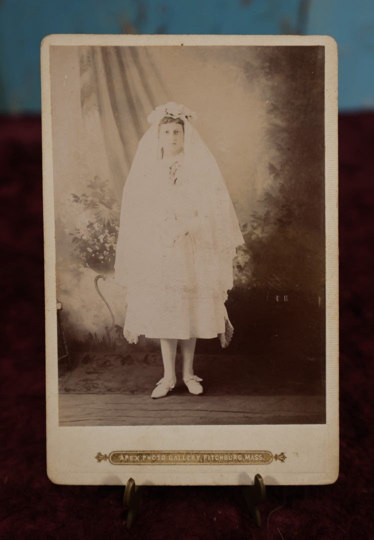 Lot 178 - Single Photo - Overexposed Cabinet Card of Young Girl On First Communion, Dressed In White, Apex Photo Gallery, Fitchburg, Massachusetts