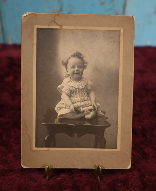 Lot 180 - Single Photo - Boarded Photo of The World's Happiest Baby, Osgood Studio, Berlin, N.H.