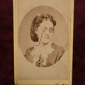 Lot 181 - Single Photo - Interesting CDV of Woman Wearing Eyeglasses, Odd Pupils, E.M. Van Aken Photographer, Lowville, New York
