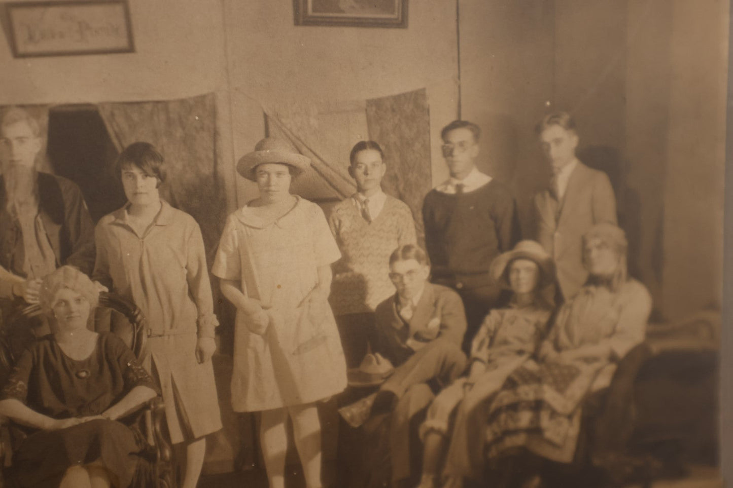 Lot 187 - Single Photo - Early 20th Century Cast of A Stage Play, Young People In Costume, Embroidered Motto On Wall