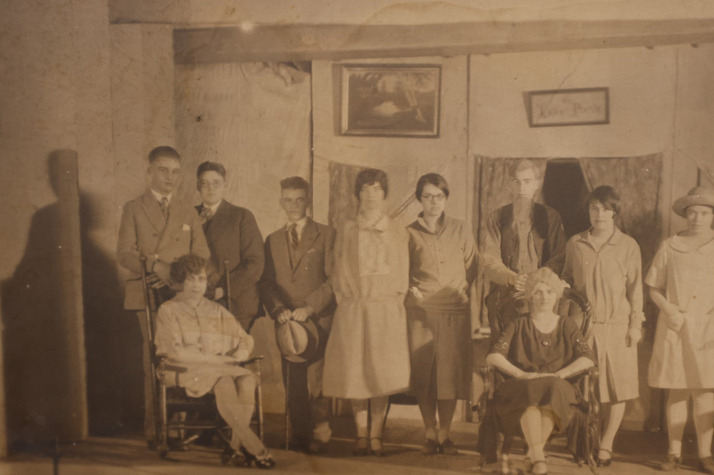 Lot 187 - Single Photo - Early 20th Century Cast of A Stage Play, Young People In Costume, Embroidered Motto On Wall