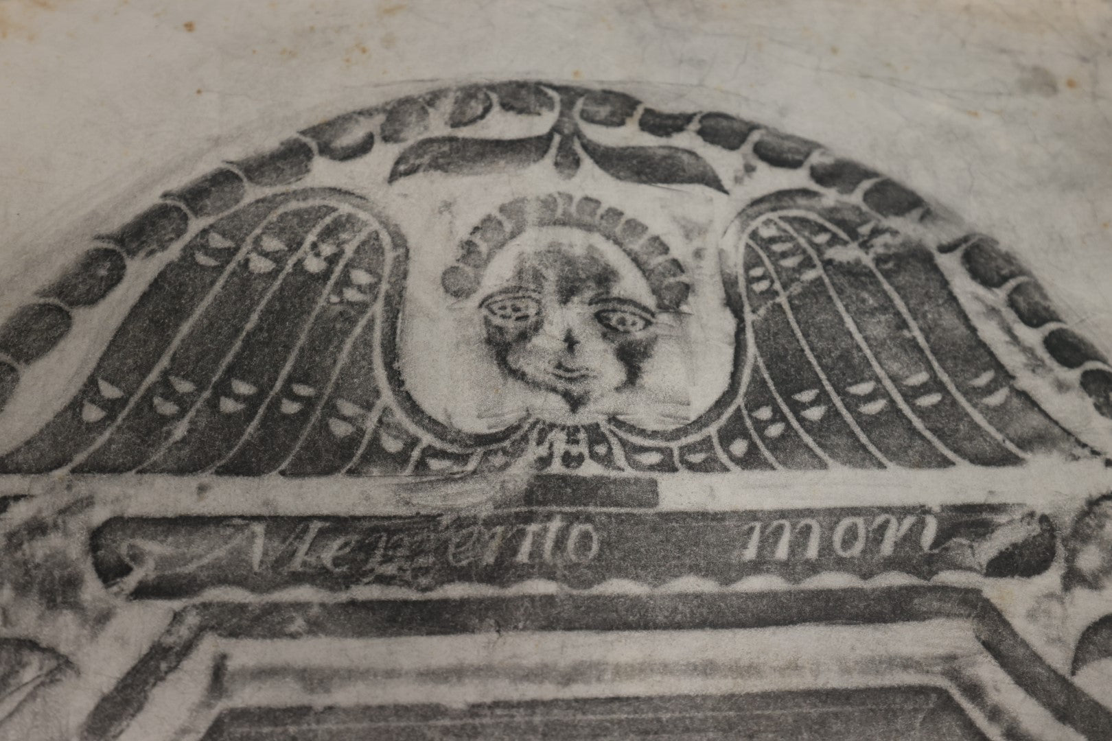 Lot 020 - Vintage Grave Rubbing of An 18th Century New England Grave Memento Mori, Name Illegible, On Paper, Unframed, Floral Designs, Winged Grinning Face, Note Severe Wear, Folds, Losses