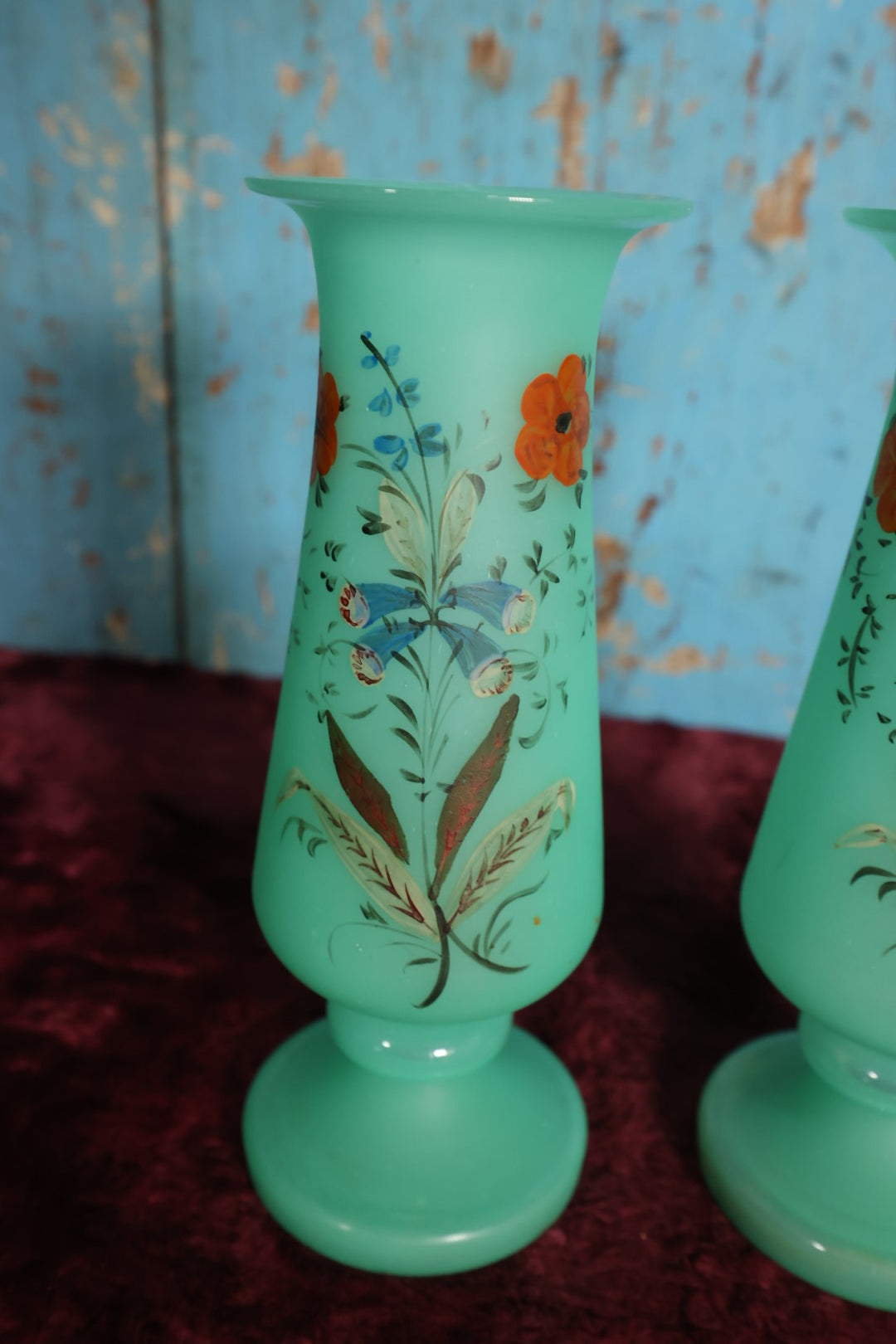 Lot 029 - Pair of Vintage Uranium Glass Vases, Opaque Glass With Hand Painted Floral Details, Strong Glow Under U.V., Note Each Has Chip On Rim