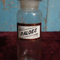 Lot 033 - Antique Pulvis Aloes, Pulverized Aloe Vera, Apothecary Bottle With Glass Label, Stopper, Approximately 9.5"