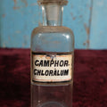 Lot 036 - Antique Camphor Chloral Hydrate Apothecary Bottle With Glass Label, Stopper, Approximately 6.75", Likely A Sedative / Anti-Neurosis / Hypnotic, Note Damage To Label