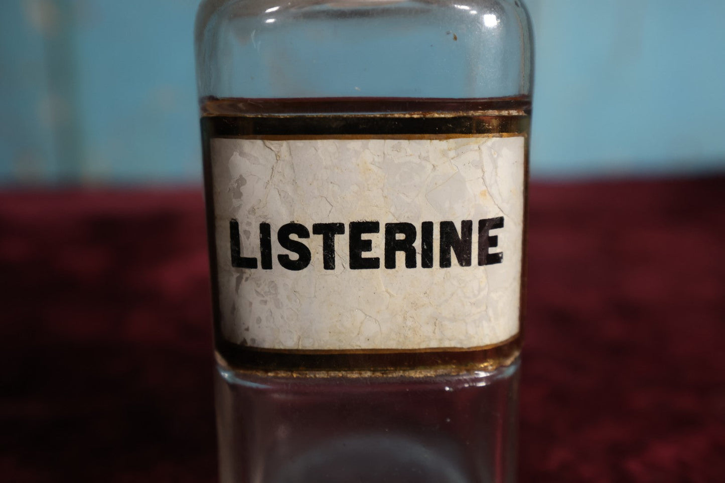 Lot 039 - Antique Listerine, Anti-Septic / Mouthwash Apothecary Bottle With Glass Label, Stopper, Approximately 5", Early Use Included Treatment of Gonorrhea