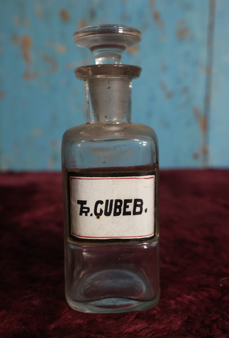 Lot 041 - Antique Tincture of Cubeb (Piper Cubeba) Solution Apothecary Bottle With Glass Label, Stopper, Approximately 5.25", Respiratory And Urinary Tract Infection Remedy