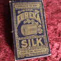 Lot 072 - Antique Eureka Brand 100 Yard Silk Spool Thread Purple Box, Cool Chain Boarder Surround - Note Wear, Losses