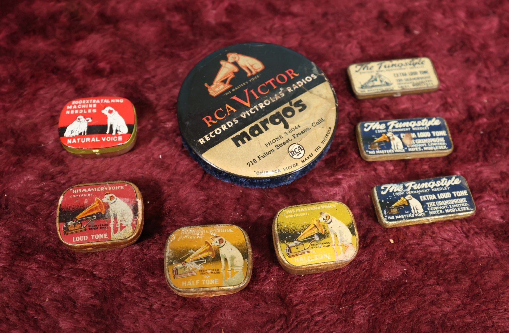 Lot 099 - Eight Piece Rca Victor Victrola Lot Featuring Nipper The Dog Mascot, Advertising For Margo's Record Store, Fresno California, Plsu Many Small Needle Tins With Needles, Contents