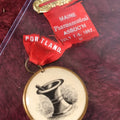 Lot 102 - Maine Pharmaceutical Association 1897 Ribbon And Badge, Portland Maine - Note Torn, Badly Damaged, Comes In Top-Loader