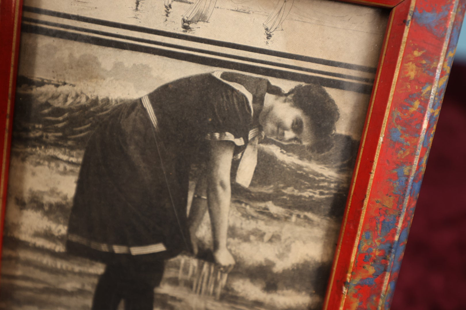 Lot 107 - Antique Framed Clipping Image Photo of Young Woman At Beach Ringing Out Her Dress, Red Painted Frame With Paint Splatter, Wood Back