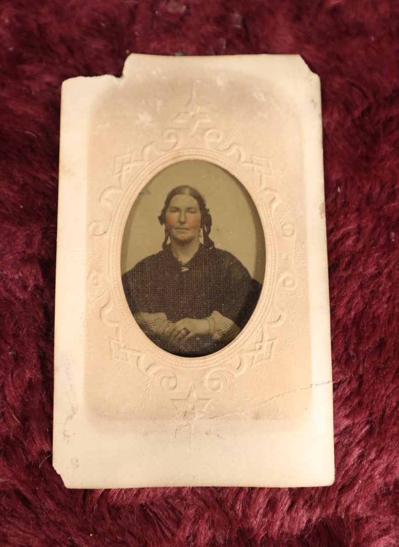 Lot 108 - Antique Ambrotype Photograph of Middle Aged Woman Wearing Ring, Uncased, With Paper Frame And Fabric Textile Tape Lack Backing, 1/9th Plate, Note Loss To Paper Frame