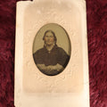 Lot 108 - Antique Ambrotype Photograph of Middle Aged Woman Wearing Ring, Uncased, With Paper Frame And Fabric Textile Tape Lack Backing, 1/9th Plate, Note Loss To Paper Frame