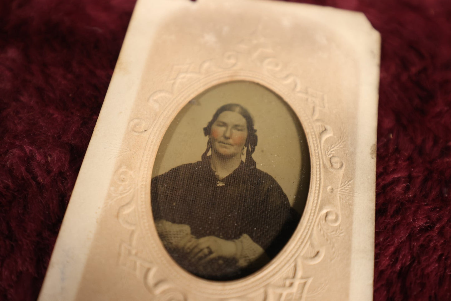 Lot 108 - Antique Ambrotype Photograph of Middle Aged Woman Wearing Ring, Uncased, With Paper Frame And Fabric Textile Tape Lack Backing, 1/9th Plate, Note Loss To Paper Frame