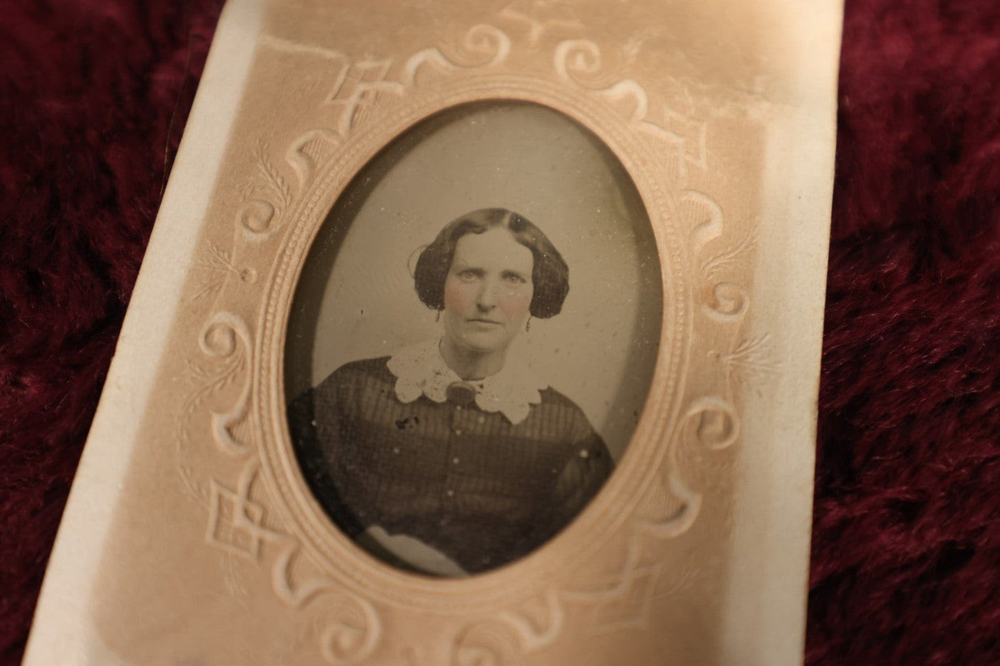 Lot 109 - Antique Ambrotype Photograph of Young Woman Wearing White Collar, Uncased, With Paper Frame And Fabric Textile Tape Lack Backing, 1/9th Plate