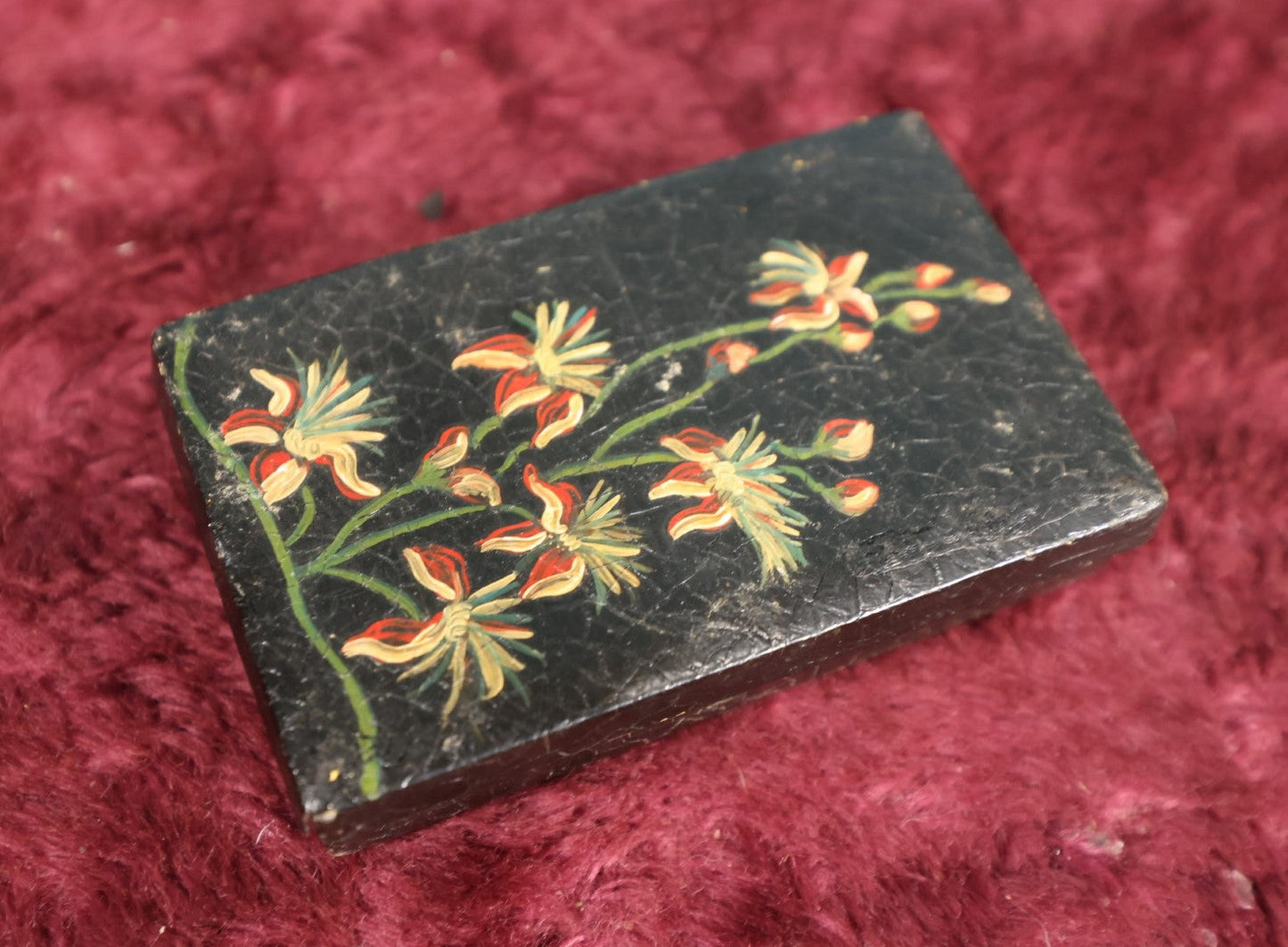 Lot 118 - Tiny Black Laquered Tin With Hand Painted Flowers