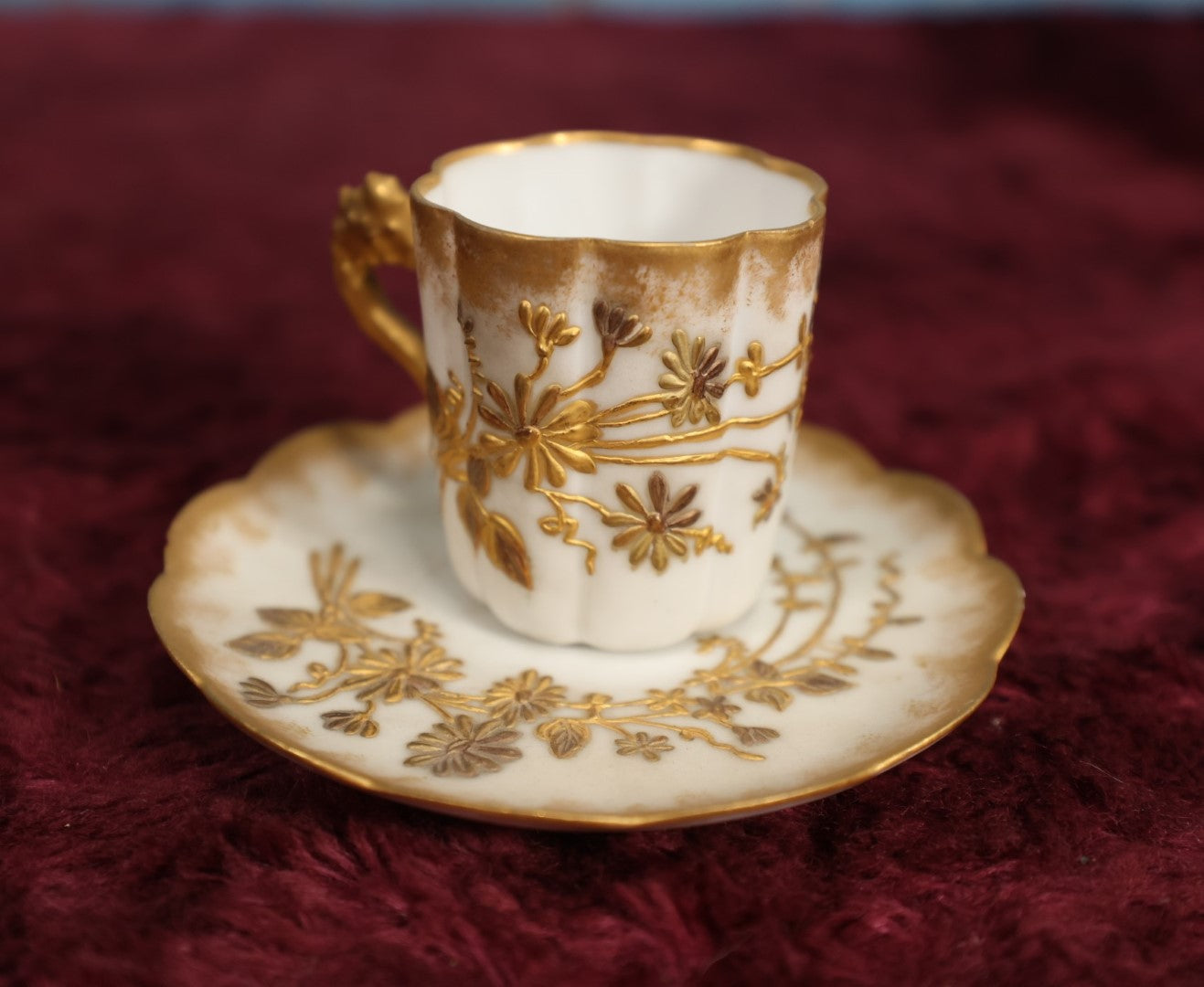 Lot 124 - Antique Delicate Porcleain Raised Gold Flowers On White Demitasse Tea Cup And Saucer