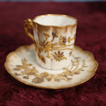 Lot 124 - Antique Delicate Porcelain Raised Gold Flowers On White Demitasse Tea Cup And Saucer