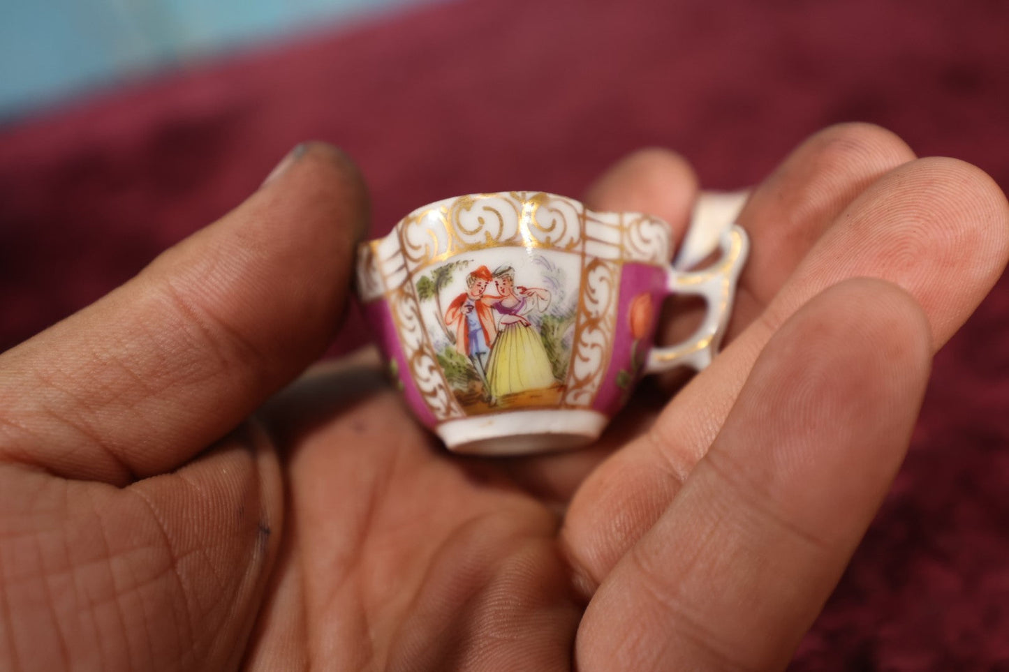 Lot 125 - Miniature Hand Painted Tea Cup, Demitasse Cup With Woman, Man, Other Designs, Mark On Bottom