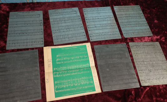 Lot 151 - Grouping of Seven Vintage Sheet Music Printing Plates, Metal, With Test Print With Notes, Songs Include: The Lights of Galilee, Dry Your Eyes My Little Weeping Willow, There's Magic In A Smile, Hello Mister Sunshine