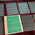 Lot 151 - Grouping of Seven Vintage Sheet Music Printing Plates, Metal, With Test Print With Notes, Songs Include: The Lights of Galilee, Dry Your Eyes My Little Weeping Willow, There's Magic In A Smile, Hello Mister Sunshine