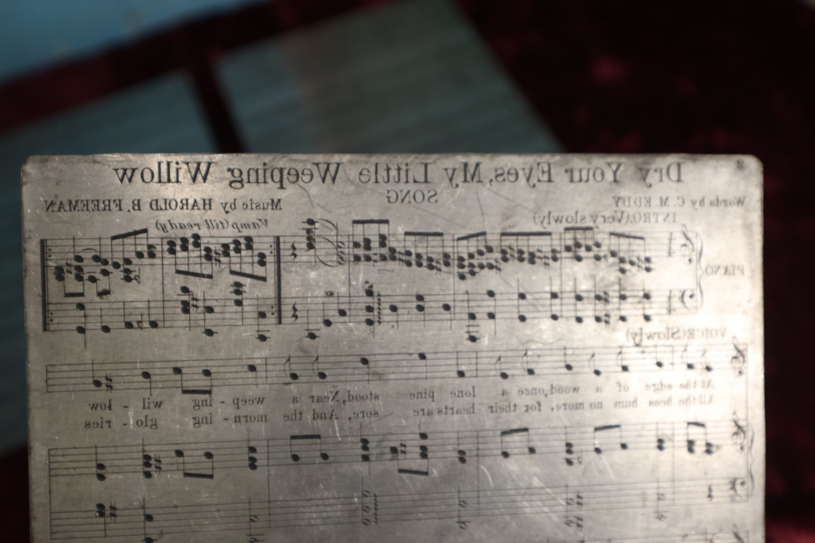 Lot 151 - Grouping of Seven Vintage Sheet Music Printing Plates, Metal, With Test Print With Notes, Songs Include: The Lights of Galilee, Dry Your Eyes My Little Weeping Willow, There's Magic In A Smile, Hello Mister Sunshine