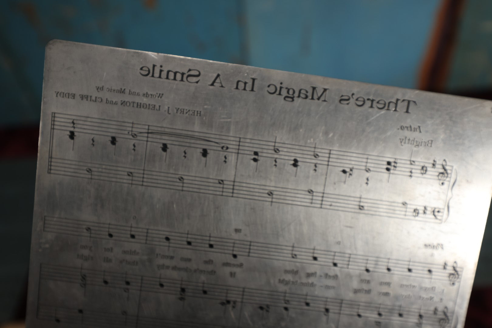 Lot 151 - Grouping of Seven Vintage Sheet Music Printing Plates, Metal, With Test Print With Notes, Songs Include: The Lights of Galilee, Dry Your Eyes My Little Weeping Willow, There's Magic In A Smile, Hello Mister Sunshine