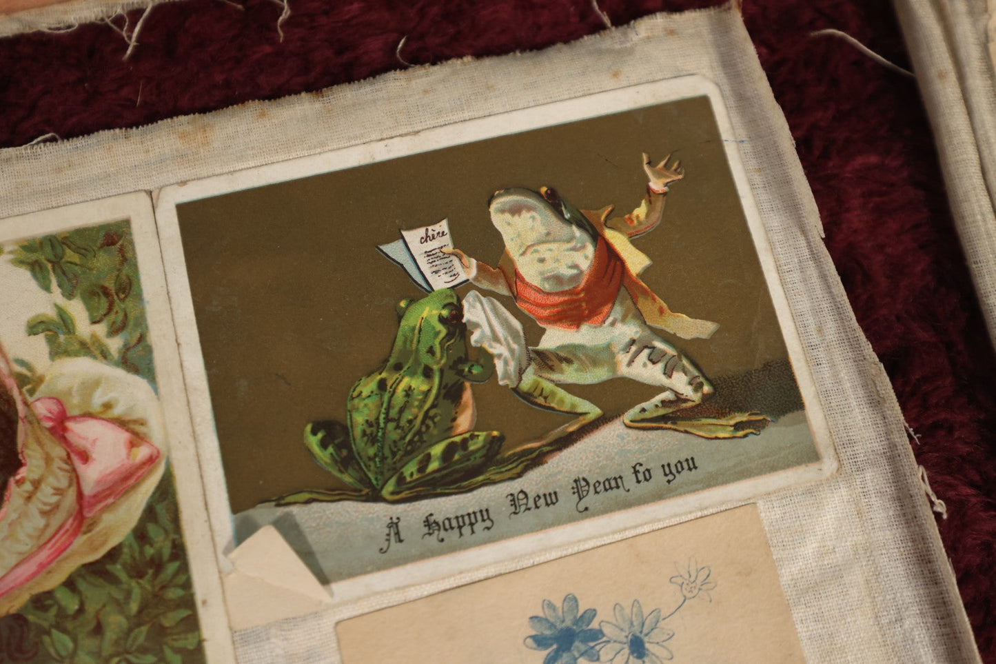 Lot 153 - Ephemera Lot - Six Loose Linen Scrapbook Pages With Victorian And Edwardian Trade Cards, Including Many With Anthropormphic Frogs, And Unusual Clippings And Comics