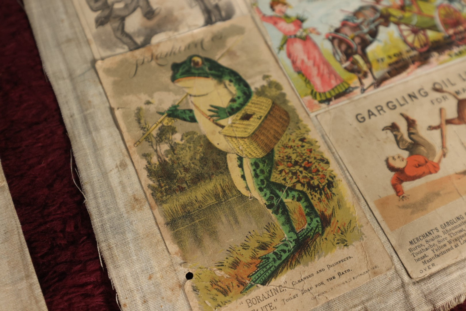 Lot 153 - Ephemera Lot - Six Loose Linen Scrapbook Pages With Victorian And Edwardian Trade Cards, Including Many With Anthropormphic Frogs, And Unusual Clippings And Comics