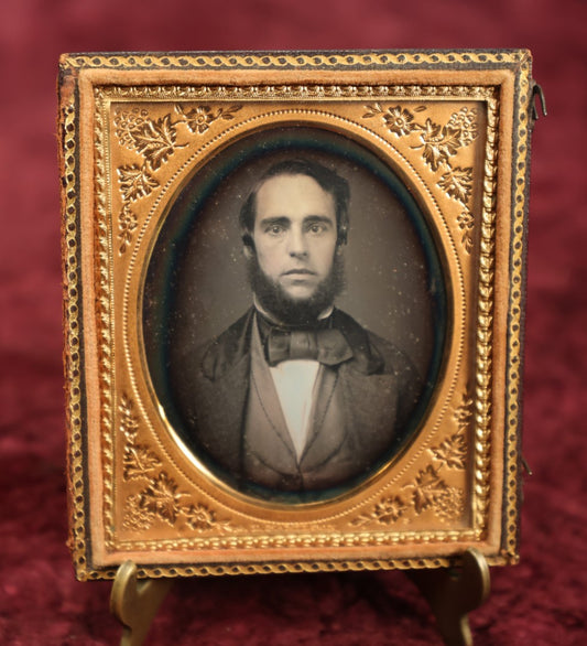 Lot 024 - Antique 1/6th Plate Daguerreotype Of Very Handsome Man With Large, Dark Eyes, Bowtie, Beard, In Half Case With Mat