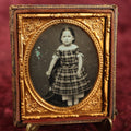 Lot 025 - Antique 1/6th Plate Daguerreotype Of Young Toddler Girl With Off The Shoulder Dress, Standing On Chair, Note Spot Of Corrosion, Left Side
