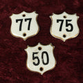 Lot 066 - Grouping Of Three Porcelain Number Badge Shields, Possibly From Hotel, Room Numbers, Including 50, 75, And 77, Various Wear, Paint Losses