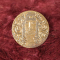 Lot 067 - Vintage Art Nouveau Art Deco Brass Pinback Pin With Woman With Jewelry, Flowing Hair, Scarf Over Face
